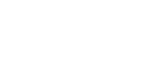 A paper plane that has landed on the floor